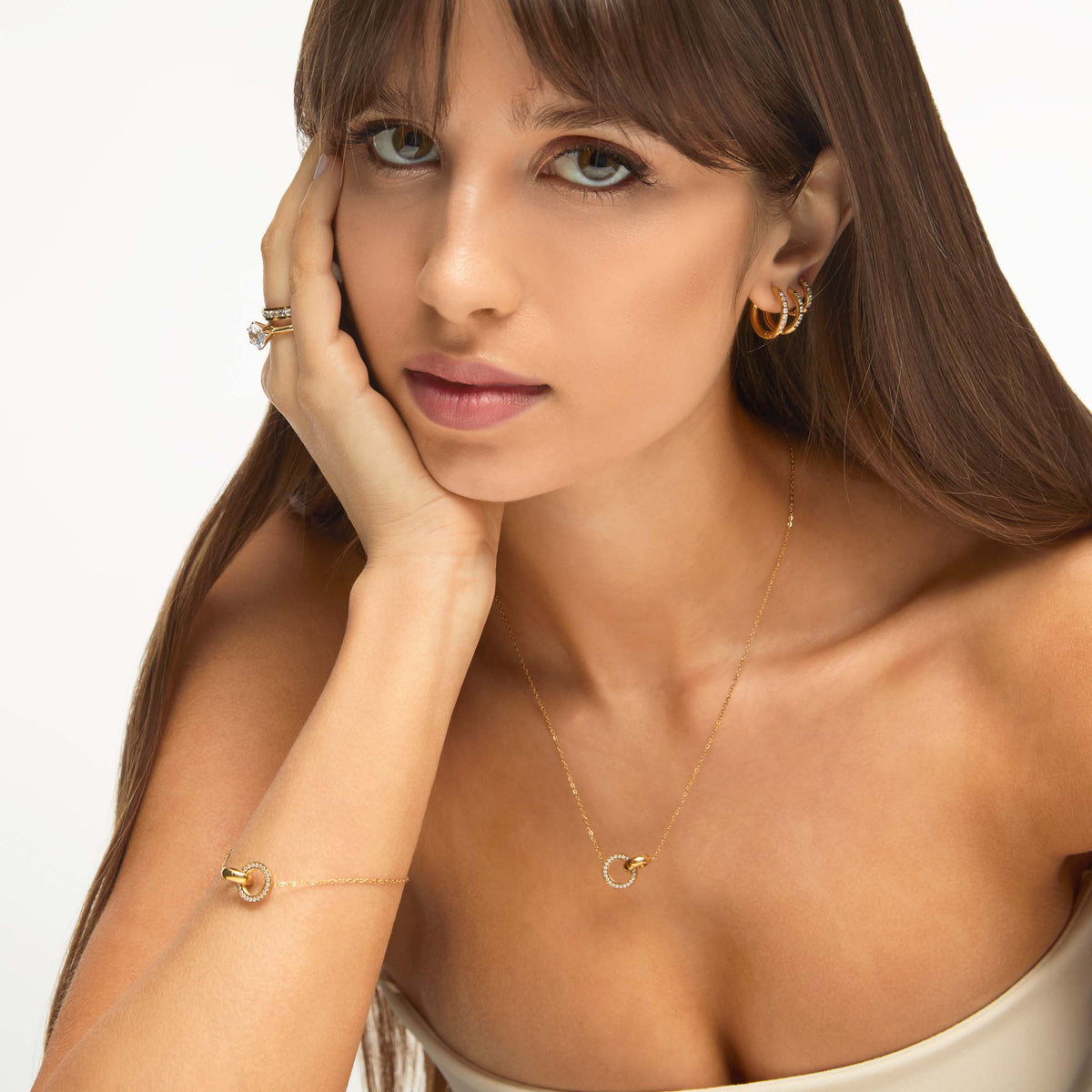 Pulseira Anéis Cruzados Banhada em Ouro 18k